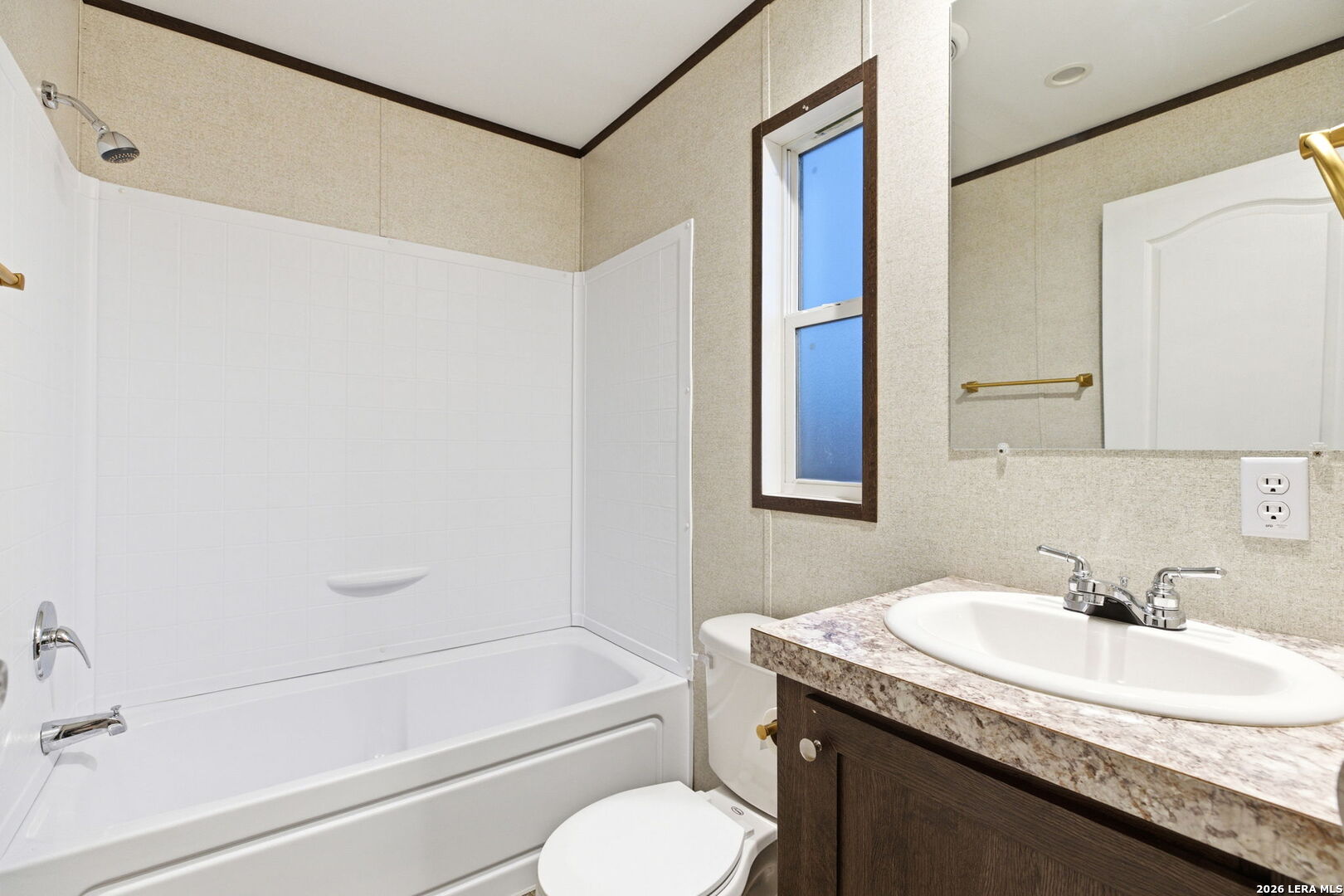 2383 Tomblin Road Bigfoot, TX 78005 - Photo 41 of 61 a bathroom with a granite countertop sink toilet and shower