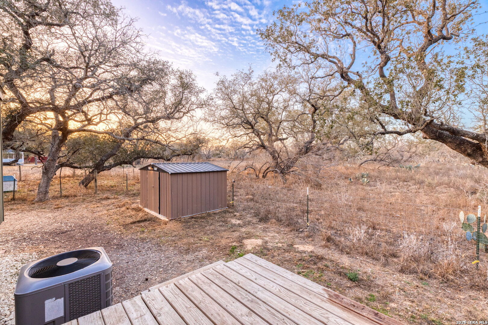 2383 Tomblin Road Bigfoot, TX 78005 - Photo 51 of 61 a backyard of a house with lots of green space
