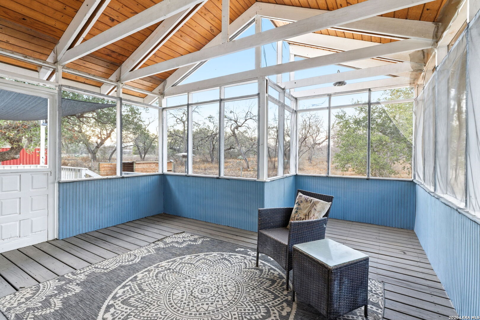 2383 Tomblin Road Bigfoot, TX 78005 - Photo 8 of 61 a living room with furniture and a large window