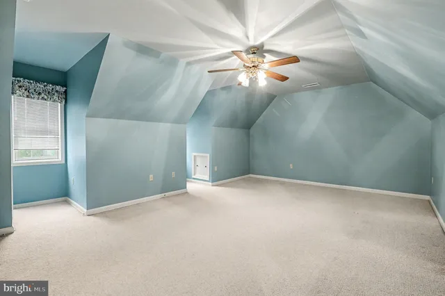 a view of balcony with wooden floor and fence