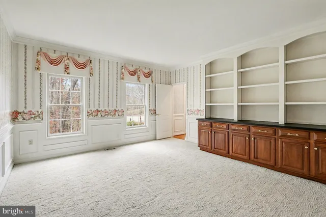 a room with furniture and window