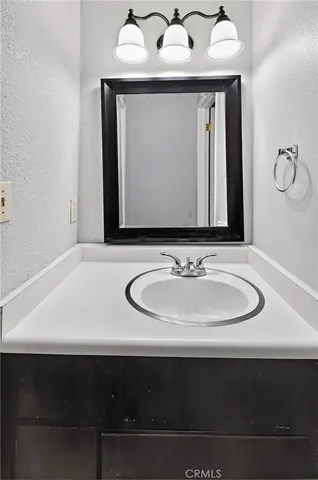 a bathroom with a shower and a bath tub