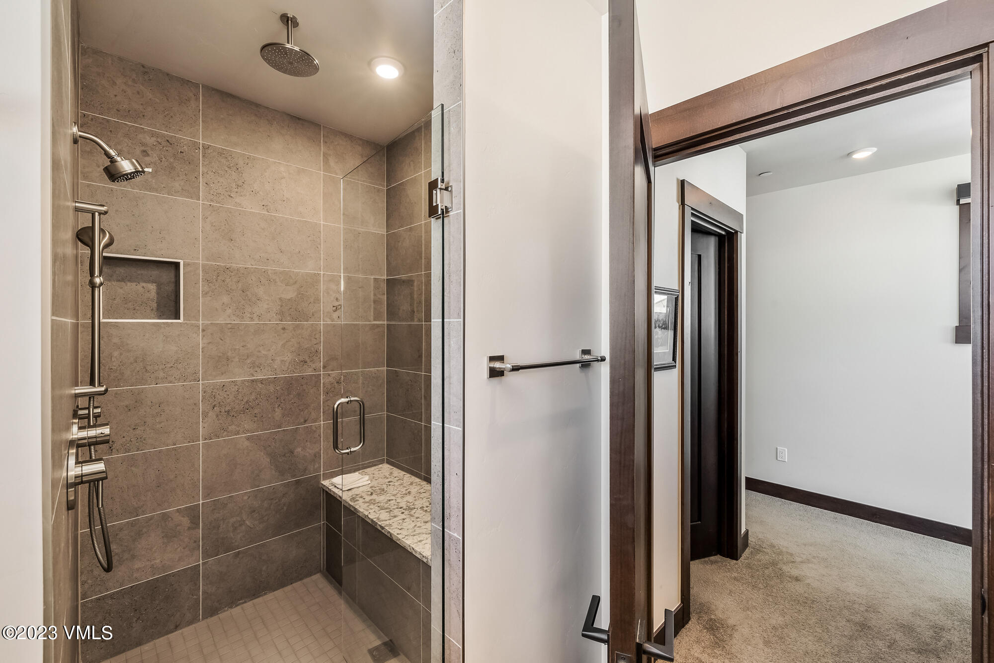 434 Hunters View Lane Eagle, CO 81631 - Photo 16 of 28 a bathroom with a shower and a glass door