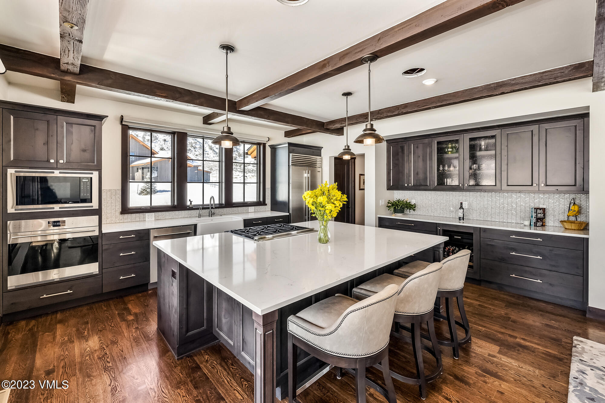 434 Hunters View Lane Eagle, CO 81631 - Photo 6 of 28 a kitchen with stainless steel appliances granite countertop a sink a stove and a refrigerator