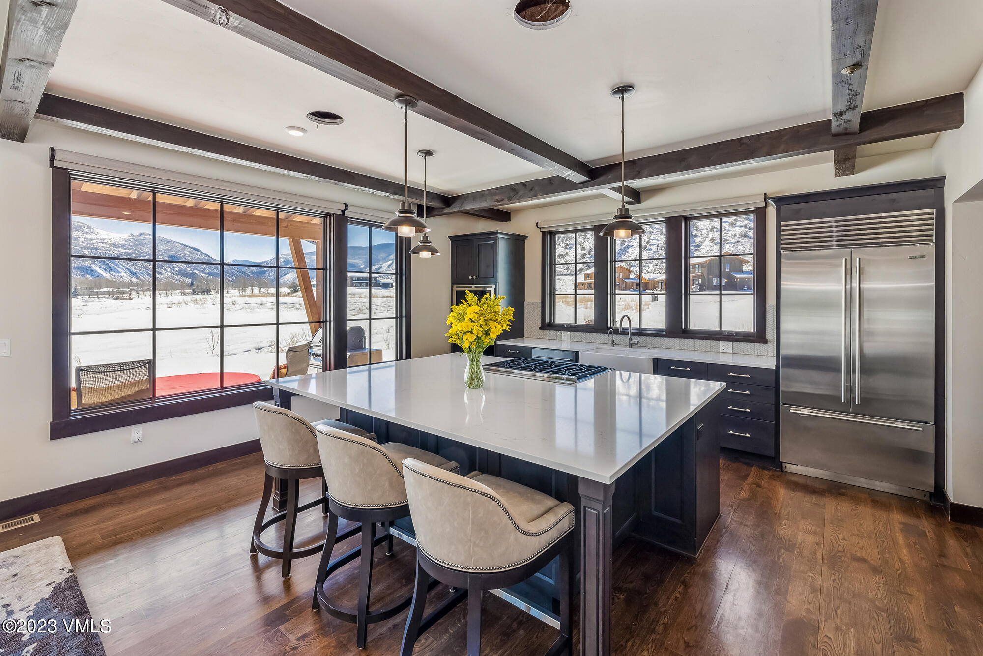 434 Hunters View Lane Eagle, CO 81631 - Photo 7 of 28 a view of a dining room with furniture window and wooden floor