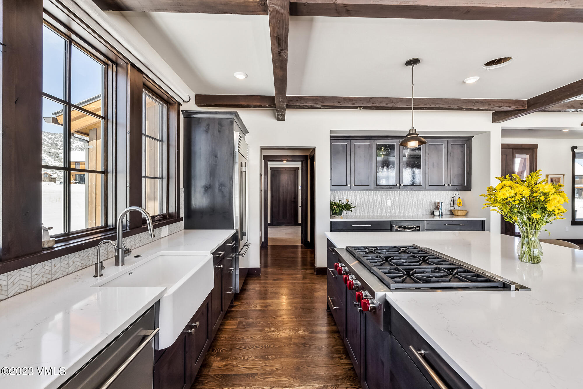 434 Hunters View Lane Eagle, CO 81631 - Photo 8 of 28 a kitchen with stainless steel appliances granite countertop a sink stove and refrigerator