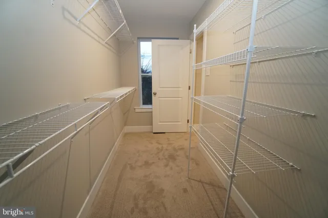 a view of a room with racks on the wall