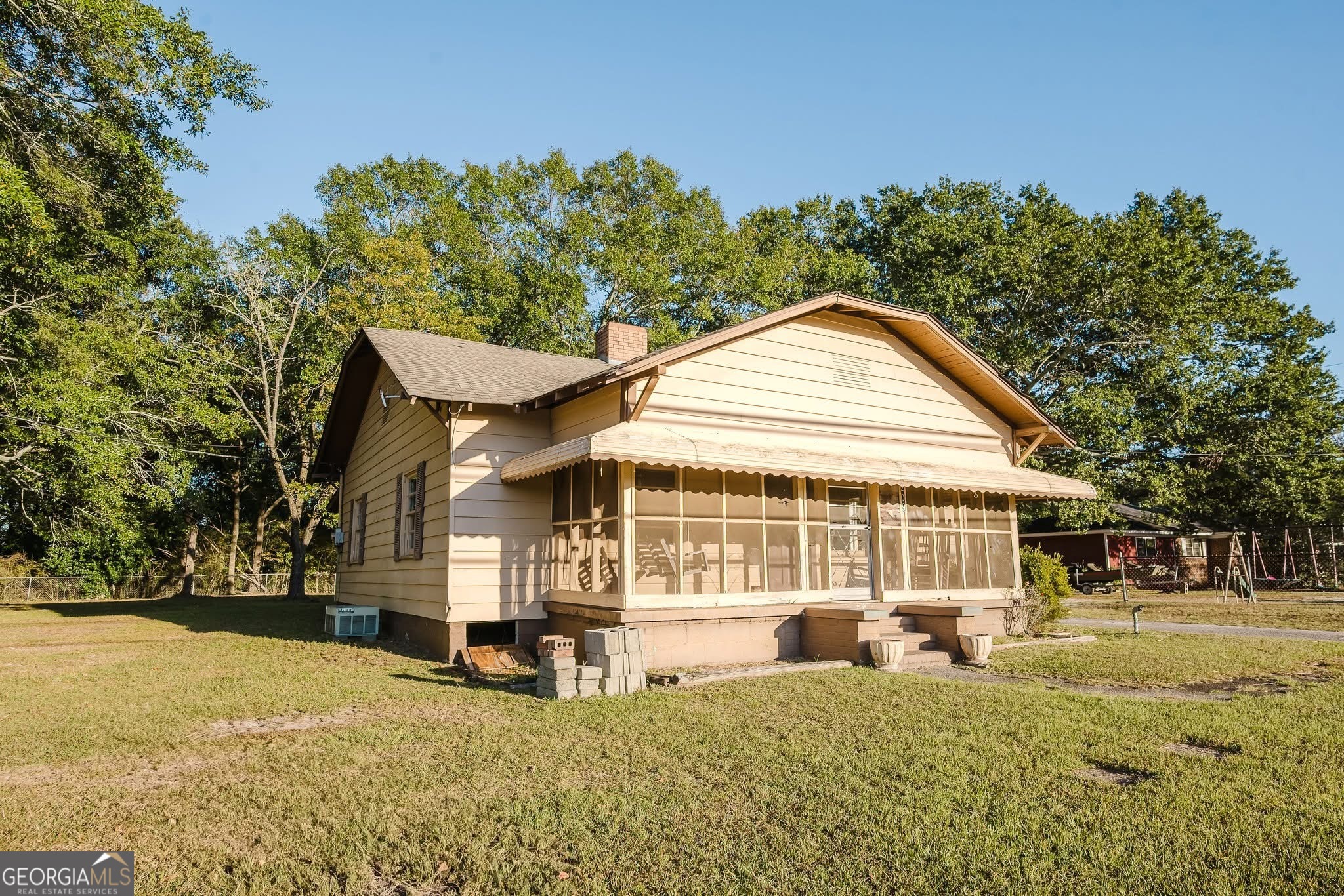 209 Mathews Street Barnesville, GA 30204 - Photo 1 of 1 a view of a house with a yard