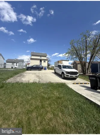 a car parked in front of a house