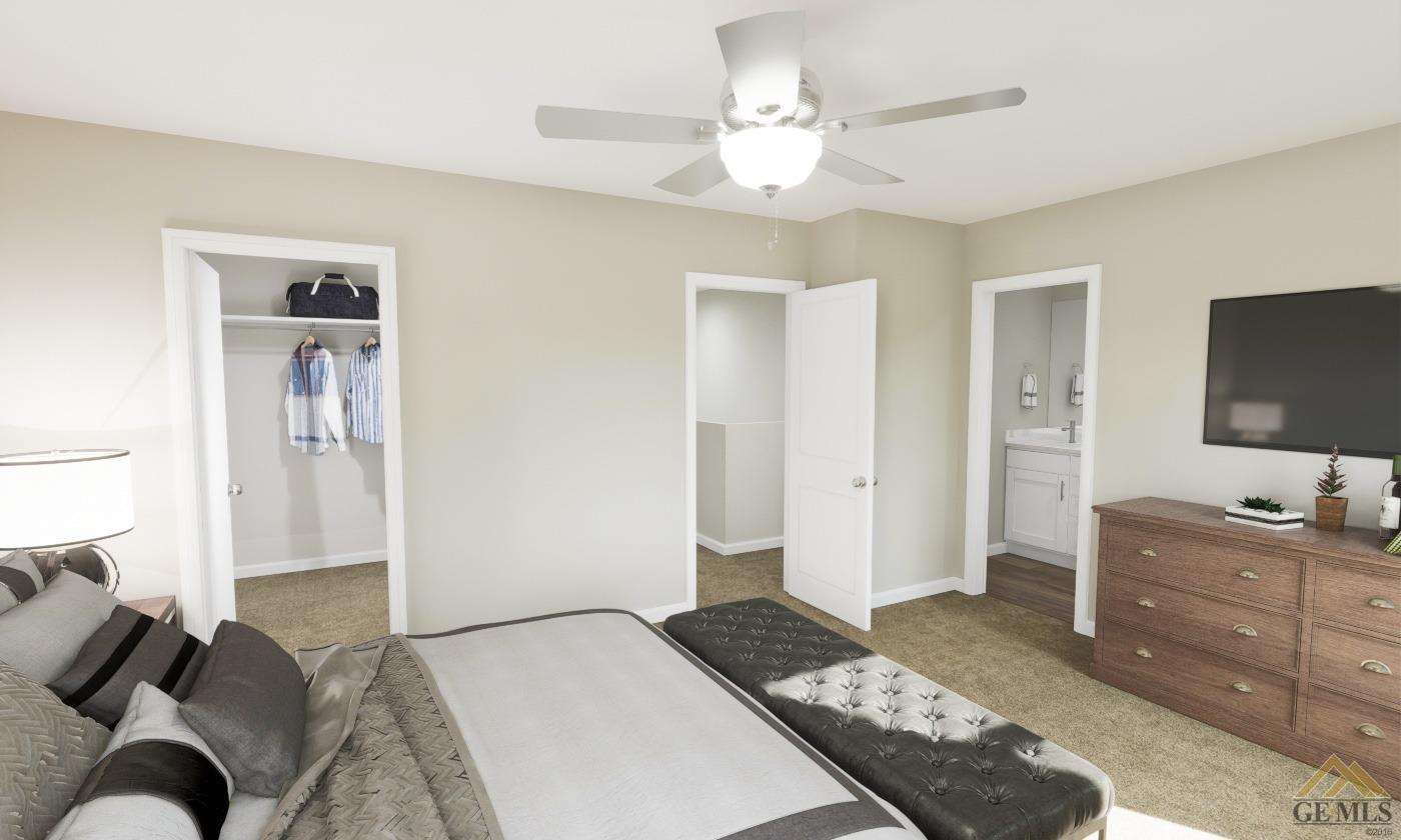 Undisclosed Address Bakersfield, CA 93313 - Photo 12 of 20 a bedroom with a bed and a flat screen tv