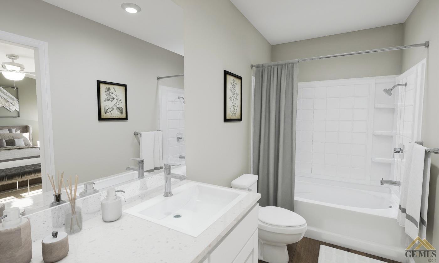 Undisclosed Address Bakersfield, CA 93313 - Photo 14 of 20 a bathroom with a sink toilet and shower