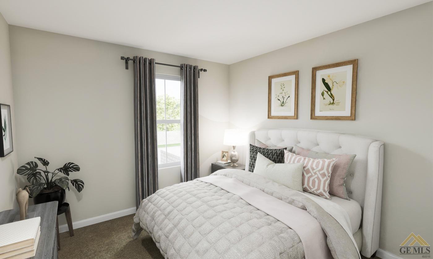 Undisclosed Address Bakersfield, CA 93313 - Photo 17 of 20 a bedroom with a bed and a potted plant