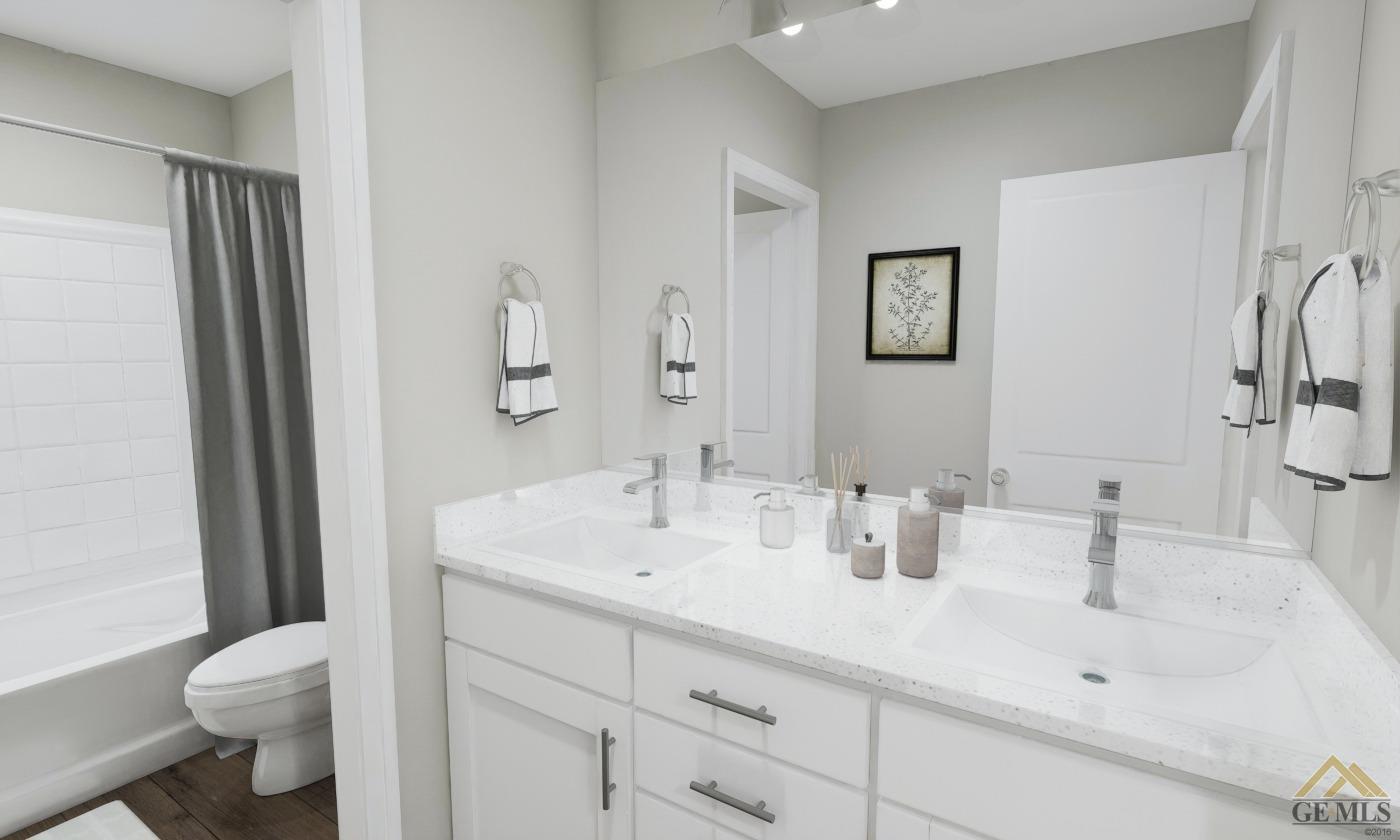 Undisclosed Address Bakersfield, CA 93313 - Photo 18 of 20 a bathroom with a sink toilet and shower