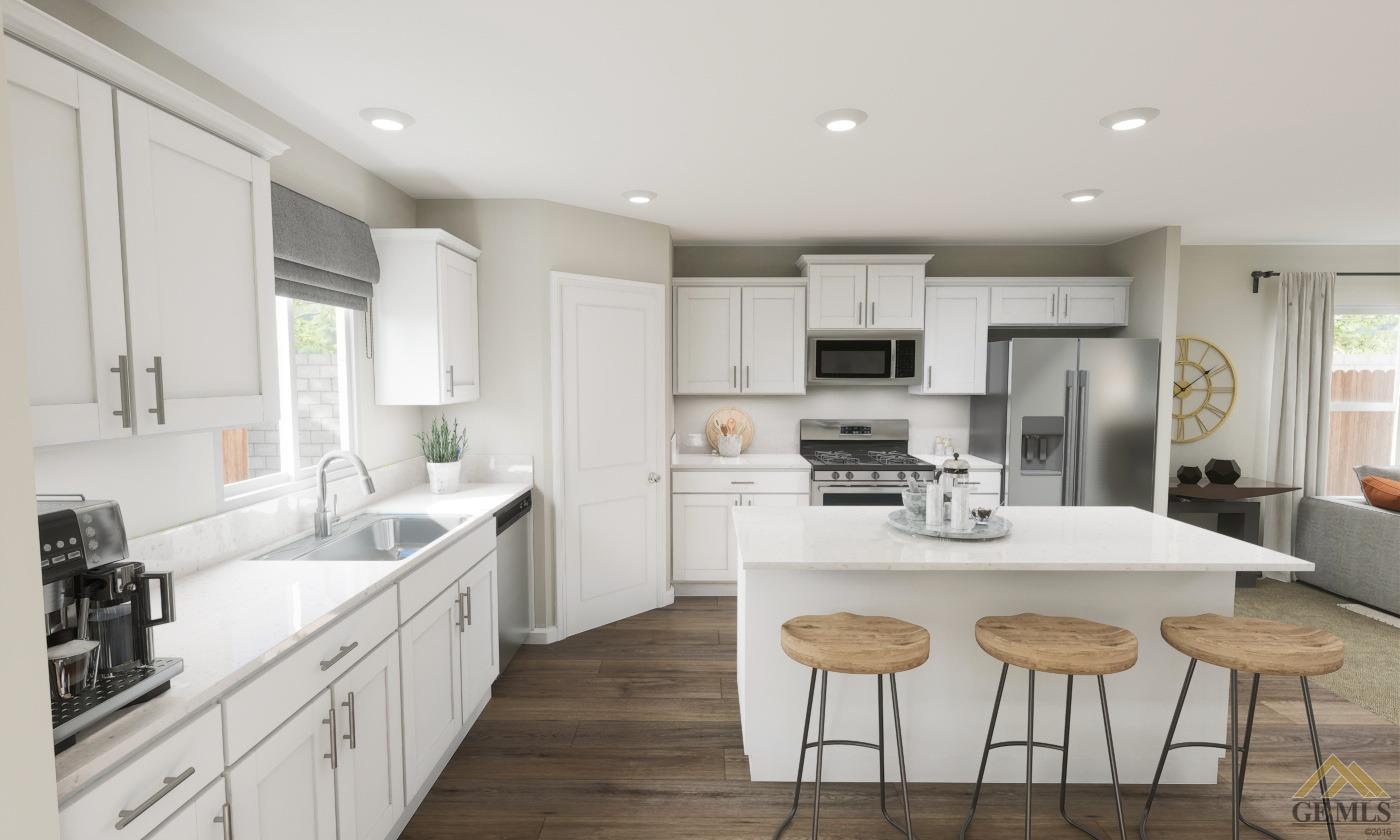 Undisclosed Address Bakersfield, CA 93313 - Photo 5 of 20 a kitchen with stainless steel appliances kitchen island granite countertop a sink and cabinets