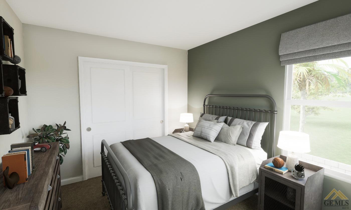 Undisclosed Address Bakersfield, CA 93313 - Photo 10 of 20 a bedroom with a bed and a potted plant