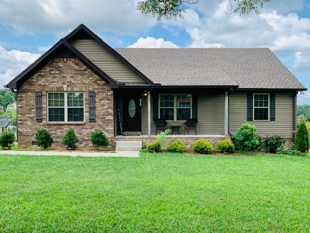 582 Keytown Road Portland, TN 37148 - Photo 1 of 18 front view of a house with a yard