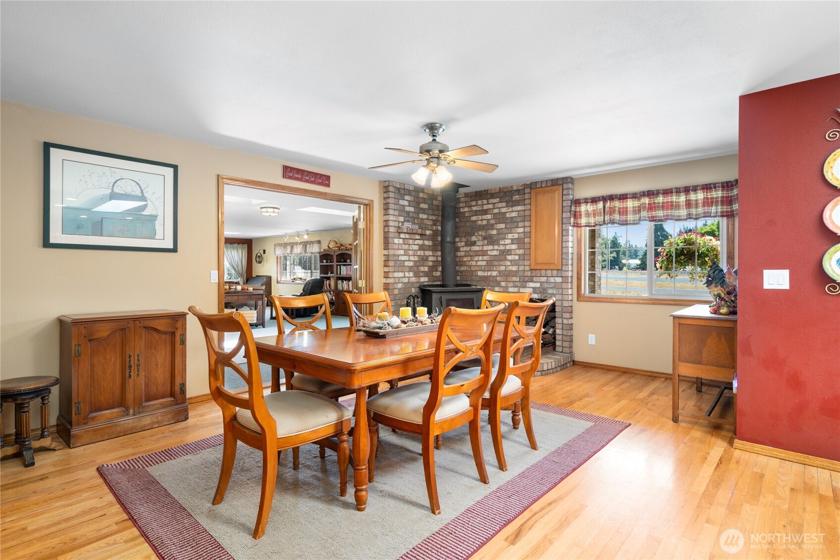 3915 Silvana Terrace Road Stanwood, WA 98292 - Photo 11 of 40 a view of a dining room with furniture window and wooden floor
