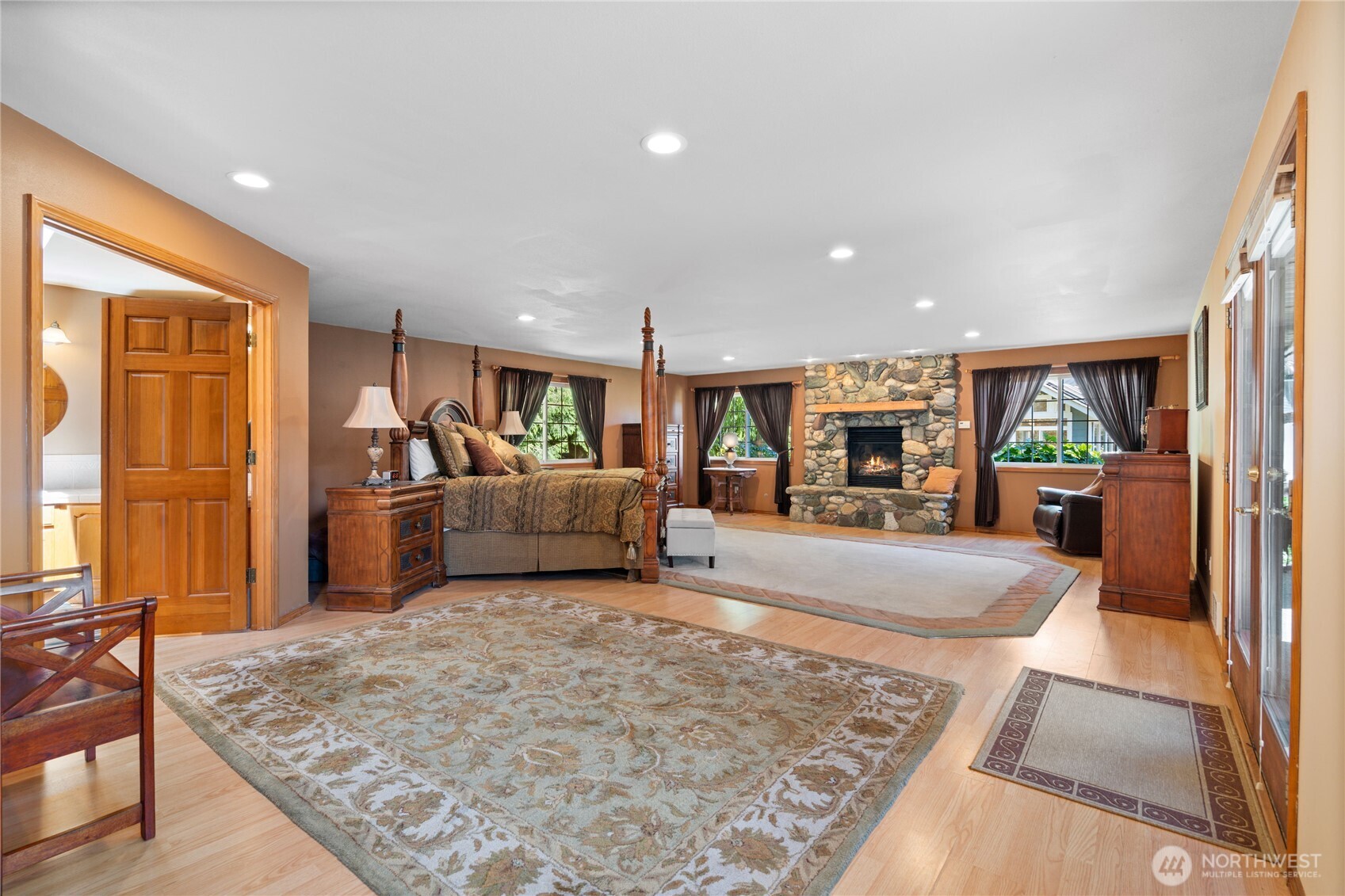 3915 Silvana Terrace Road Stanwood, WA 98292 - Photo 21 of 40 a large living room with stainless steel appliances furniture