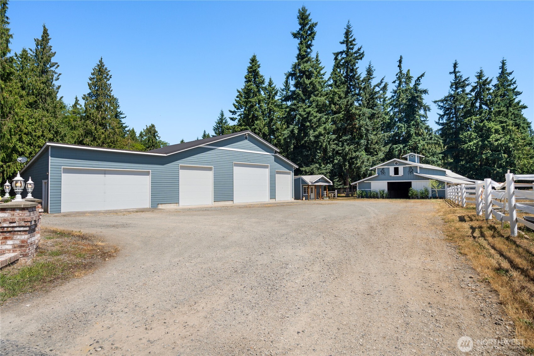 3915 Silvana Terrace Road Stanwood, WA 98292 - Photo 27 of 40 a view of garage of house with green space