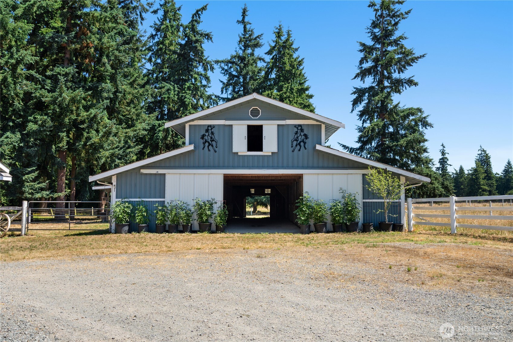 3915 Silvana Terrace Road Stanwood, WA 98292 - Photo 32 of 40 a front view of a house with garden