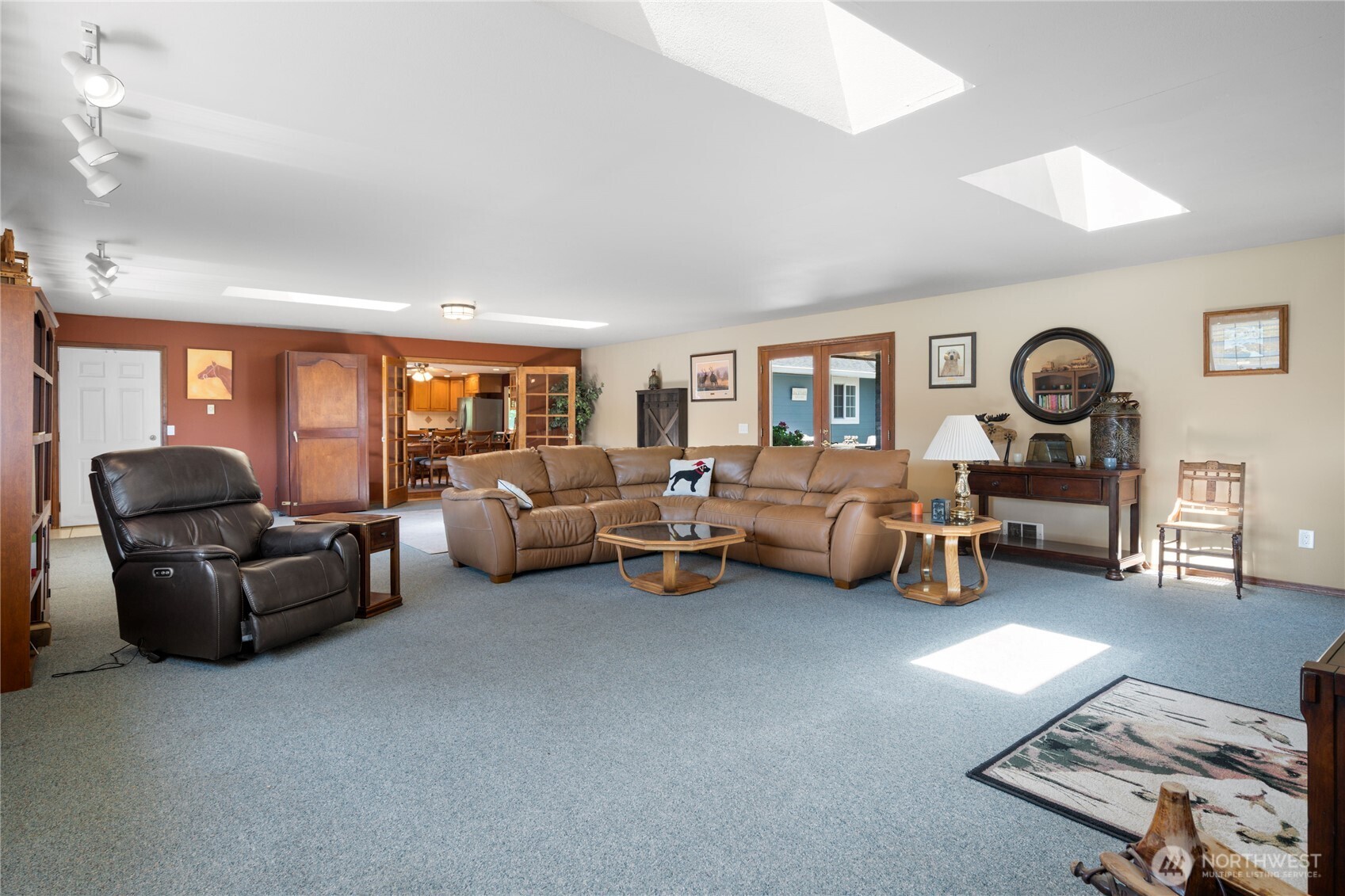 3915 Silvana Terrace Road Stanwood, WA 98292 - Photo 10 of 40 a living room with furniture and a large window