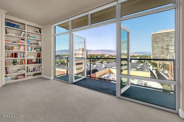 a view of a balcony with city view