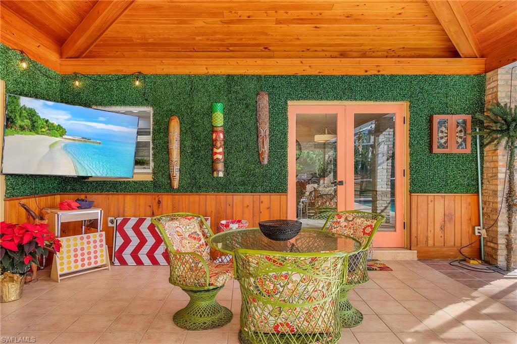 2950 Coach House Lane Naples, FL 34105 - Photo 27 of 50 a view of outdoor space patio and swimming pool