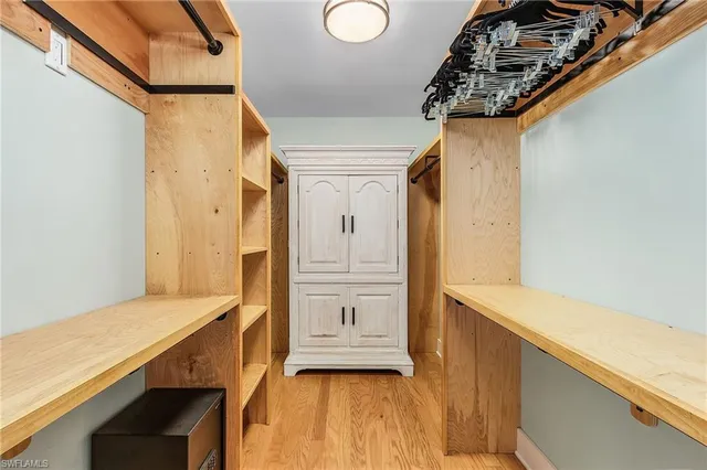 an aerial view of a house with pool garden and outdoor seating