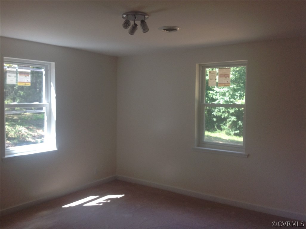 4563 New Line Road Gum Spring, VA 23065 - Photo 7 of 11 an empty room with a window