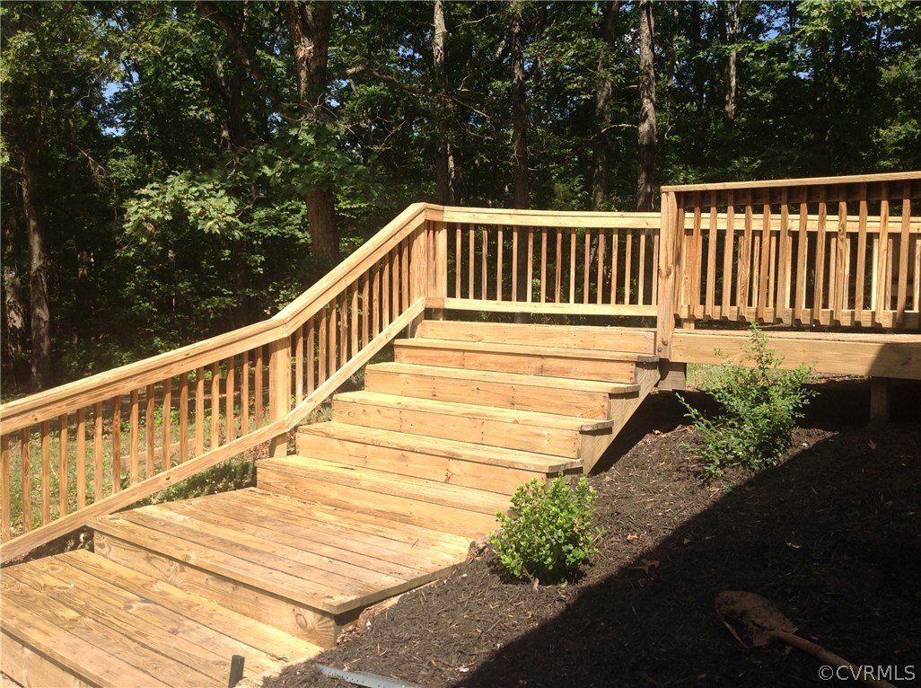 4563 New Line Road Gum Spring, VA 23065 - Photo 9 of 11 a view of a balcony with wooden floor