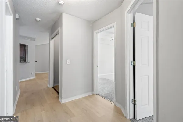 a view of entryway with bathroom