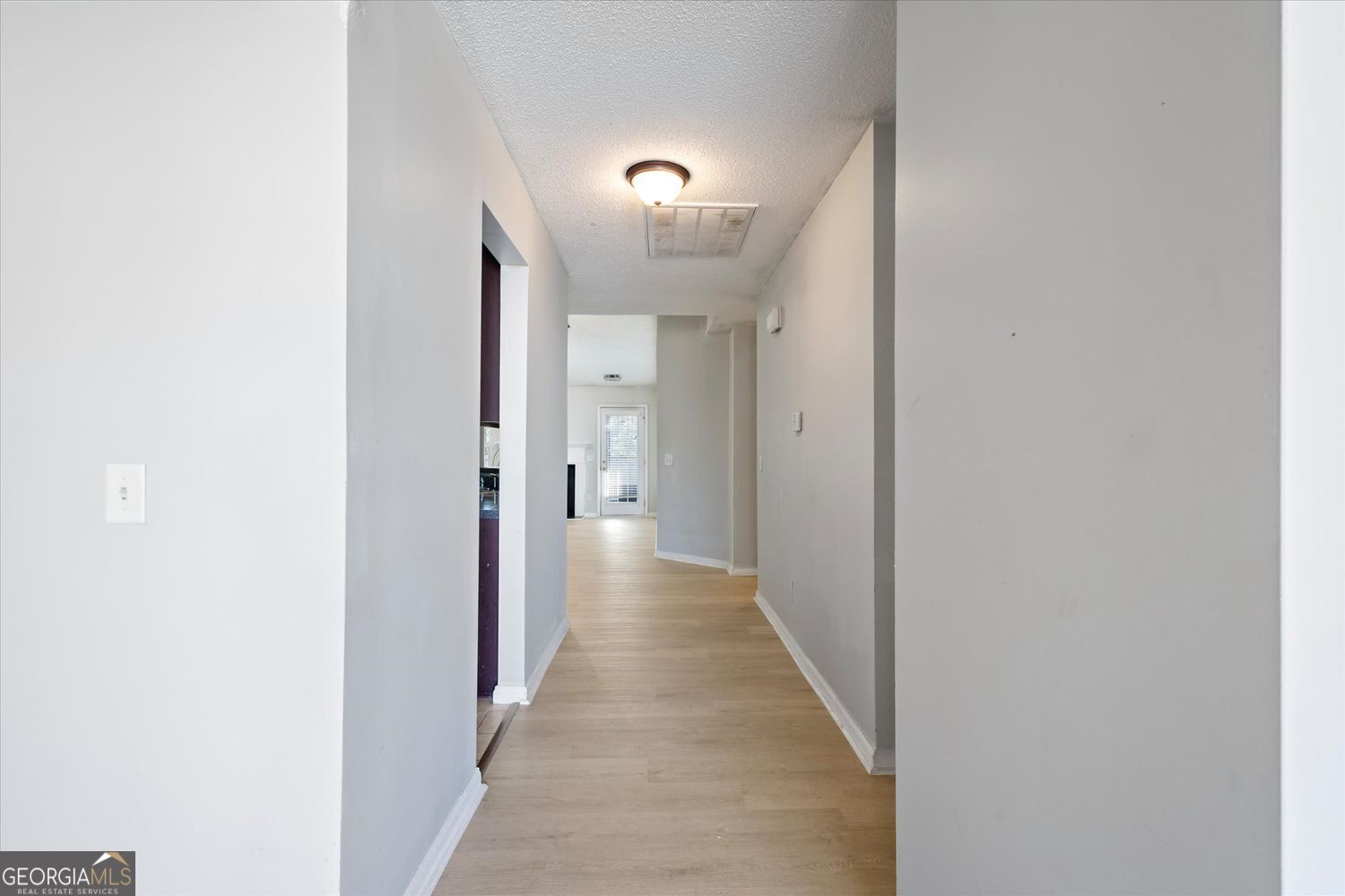 118 Covington Cove Byron, GA 31008 - Photo 7 of 21 a view of a hallway with wooden floor