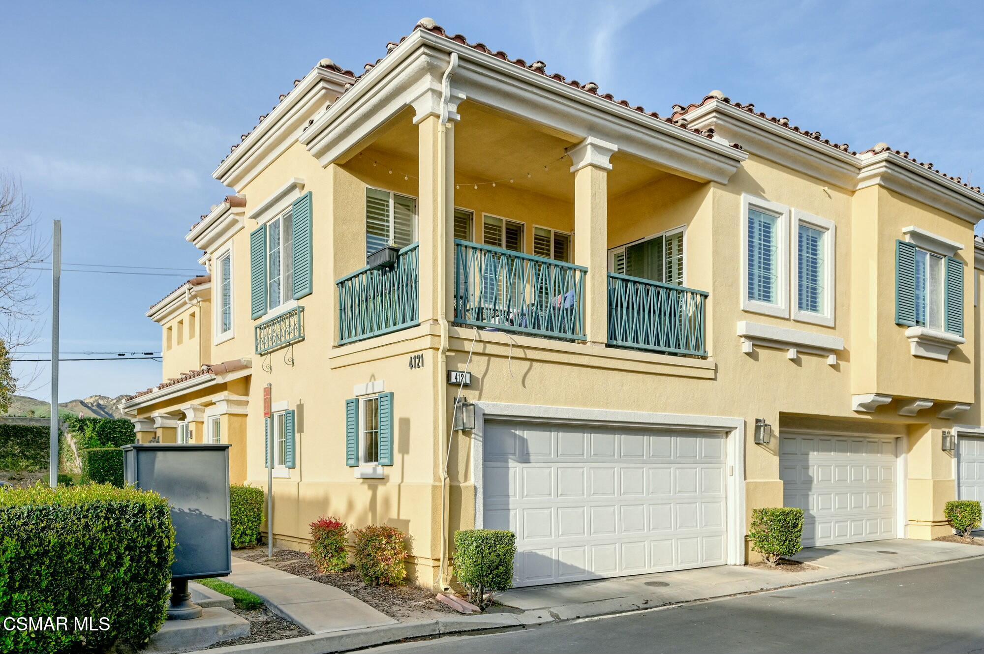 a view of a building with a street