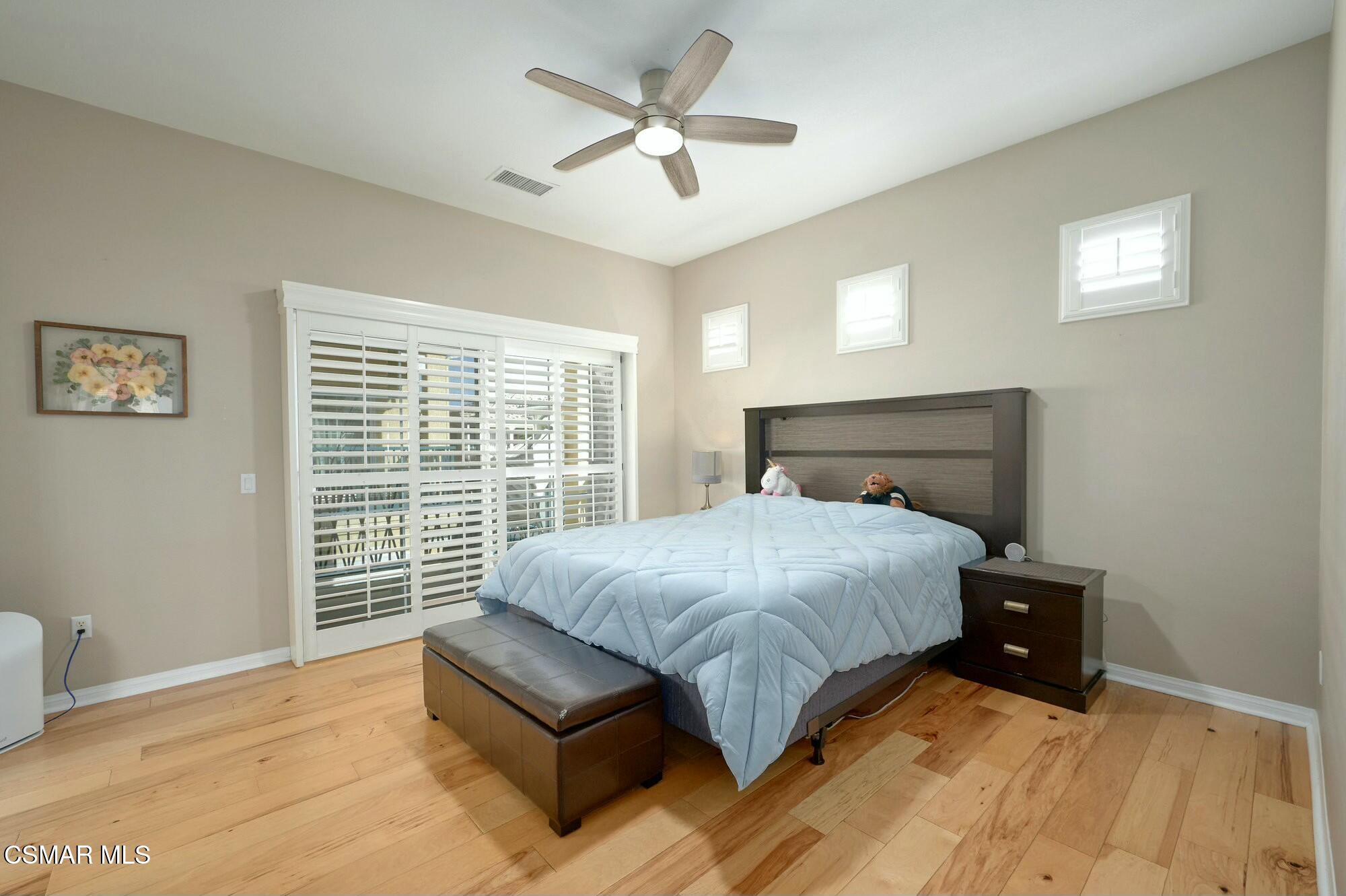 4121 Paredo Way, Unit D Simi Valley, CA 93063 - Photo 13 of 29 a bedroom with a bed and window