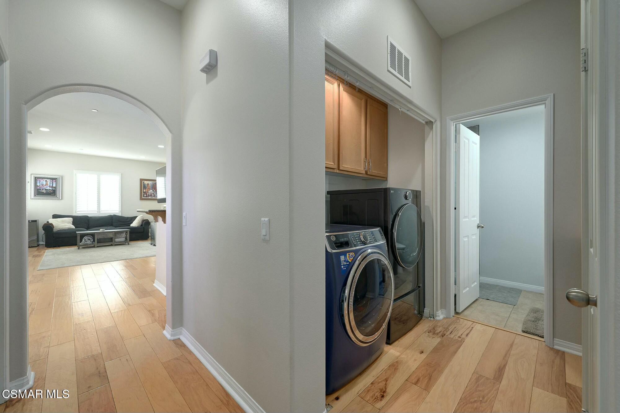 4121 Paredo Way, Unit D Simi Valley, CA 93063 - Photo 20 of 29 a view of a hallway with washer and dryer