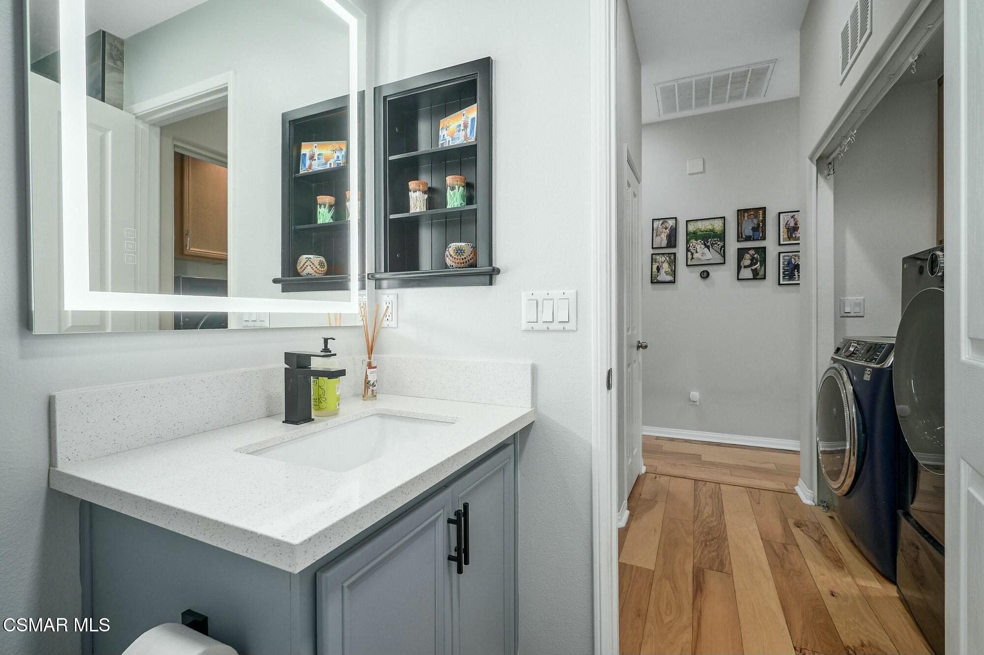 4121 Paredo Way, Unit D Simi Valley, CA 93063 - Photo 23 of 29 a bathroom with a sink a vanity and a shower