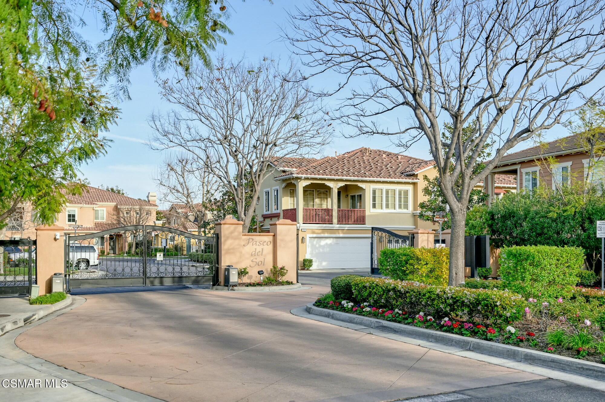 4121 Paredo Way, Unit D Simi Valley, CA 93063 - Photo 26 of 29 a front view of a house with a garden