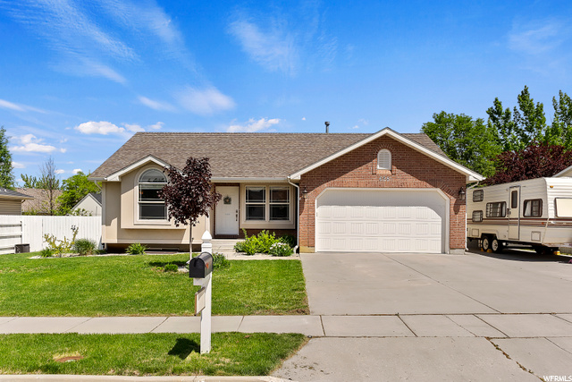 628 2500 South Perry, UT 84302 - Photo 1 of 1 Single story home with a front yard