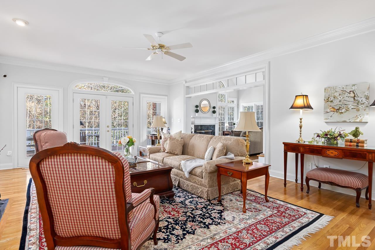 8712 Bell Grove Way Raleigh, NC 27615 - Photo 12 of 42 a living room with furniture and a rug