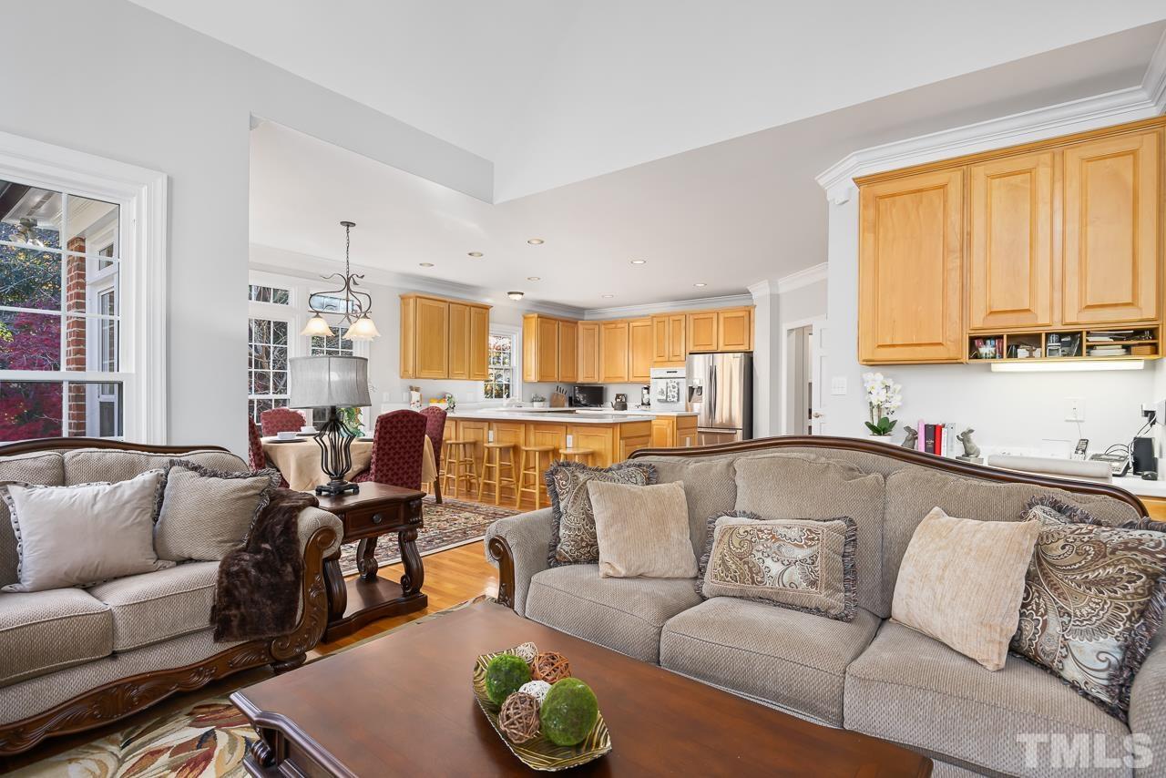 8712 Bell Grove Way Raleigh, NC 27615 - Photo 15 of 42 a living room with furniture and a large window