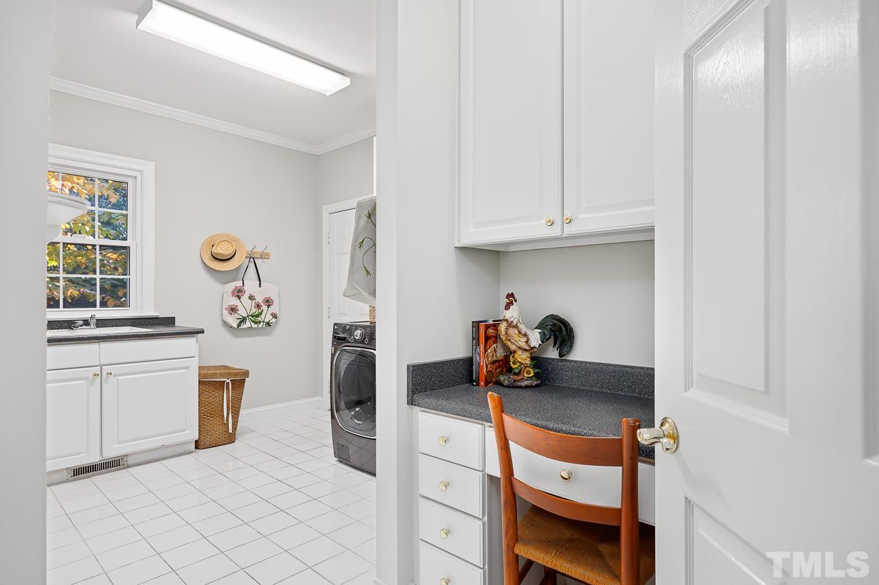 8712 Bell Grove Way Raleigh, NC 27615 - Photo 21 of 42 a bedroom with a bed and a window