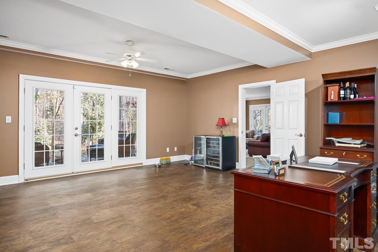 8712 Bell Grove Way Raleigh, NC 27615 - Photo 34 of 42 a room with furniture and a large window