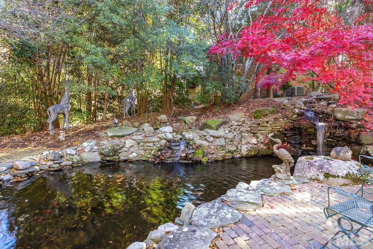 8712 Bell Grove Way Raleigh, NC 27615 - Photo 38 of 42 a view of lake with green space