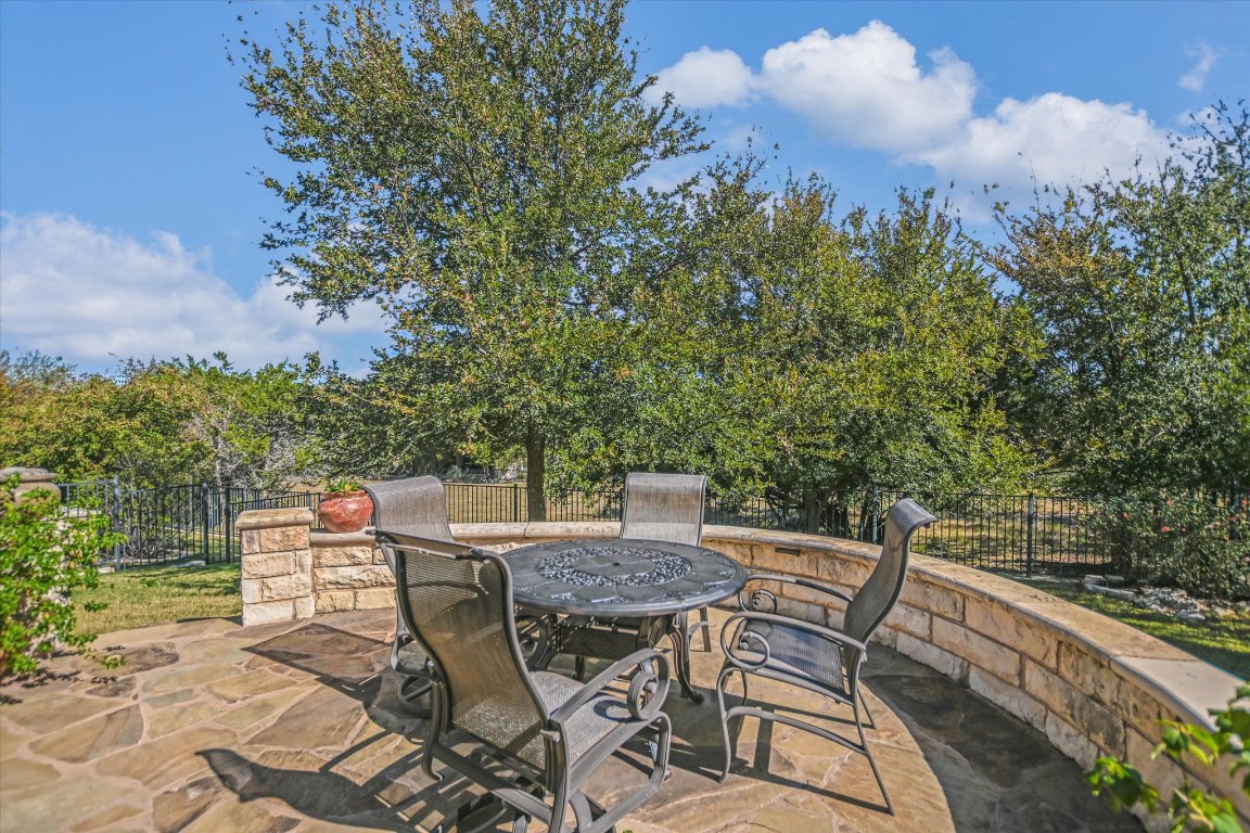 113 Cathedral Mountain Pass Georgetown, TX 78633 - Photo 25 of 29 a view of a chairs and table in the terrace
