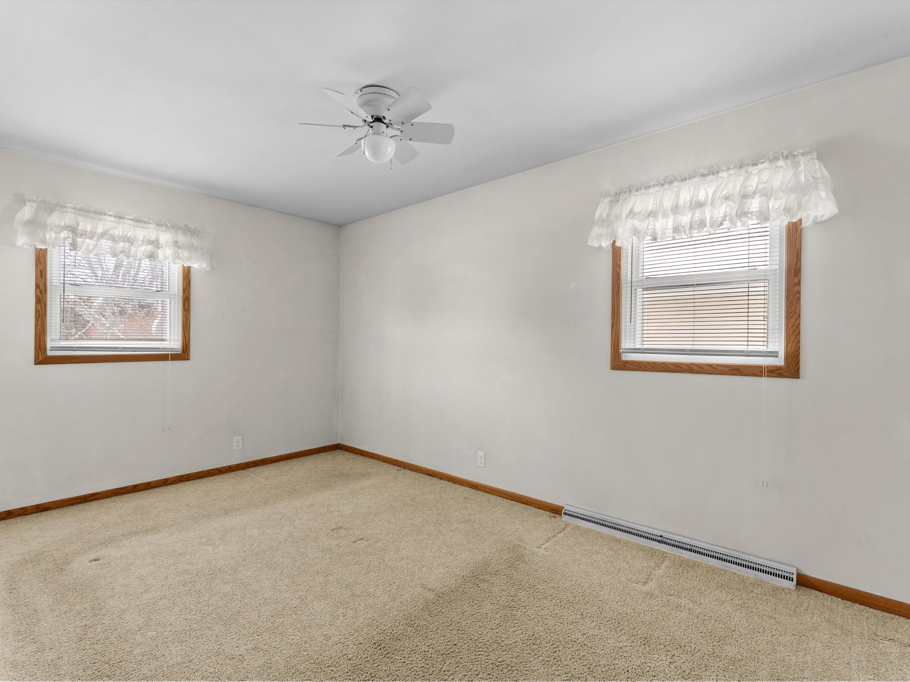 2136 Richmond Avenue Manitowoc, WI 54220 - Photo 11 of 31 Rumor is there is hardwood floor beneath these carpets..