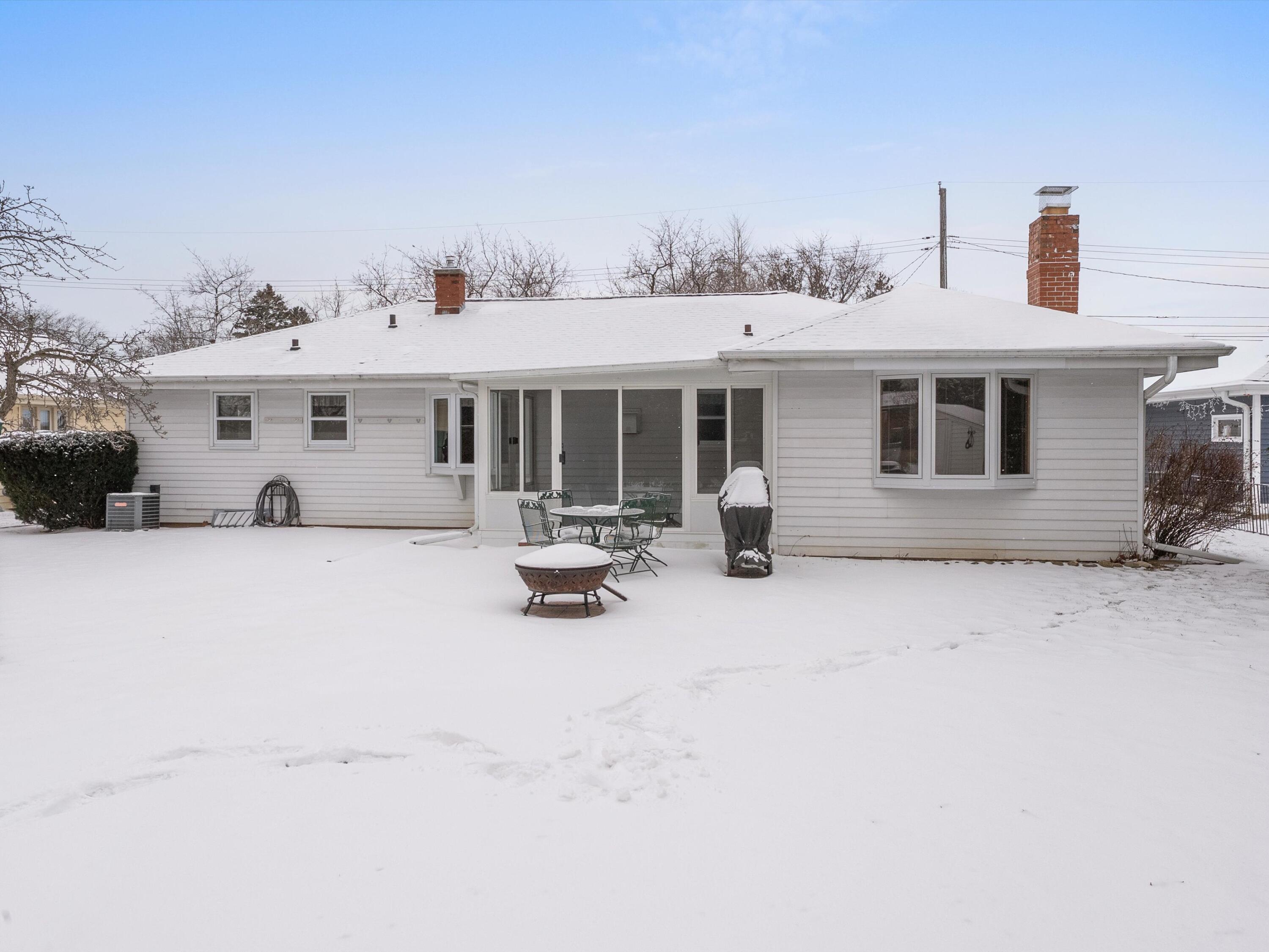 2136 Richmond Avenue Manitowoc, WI 54220 - Photo 19 of 31 Back of house with Sunroom