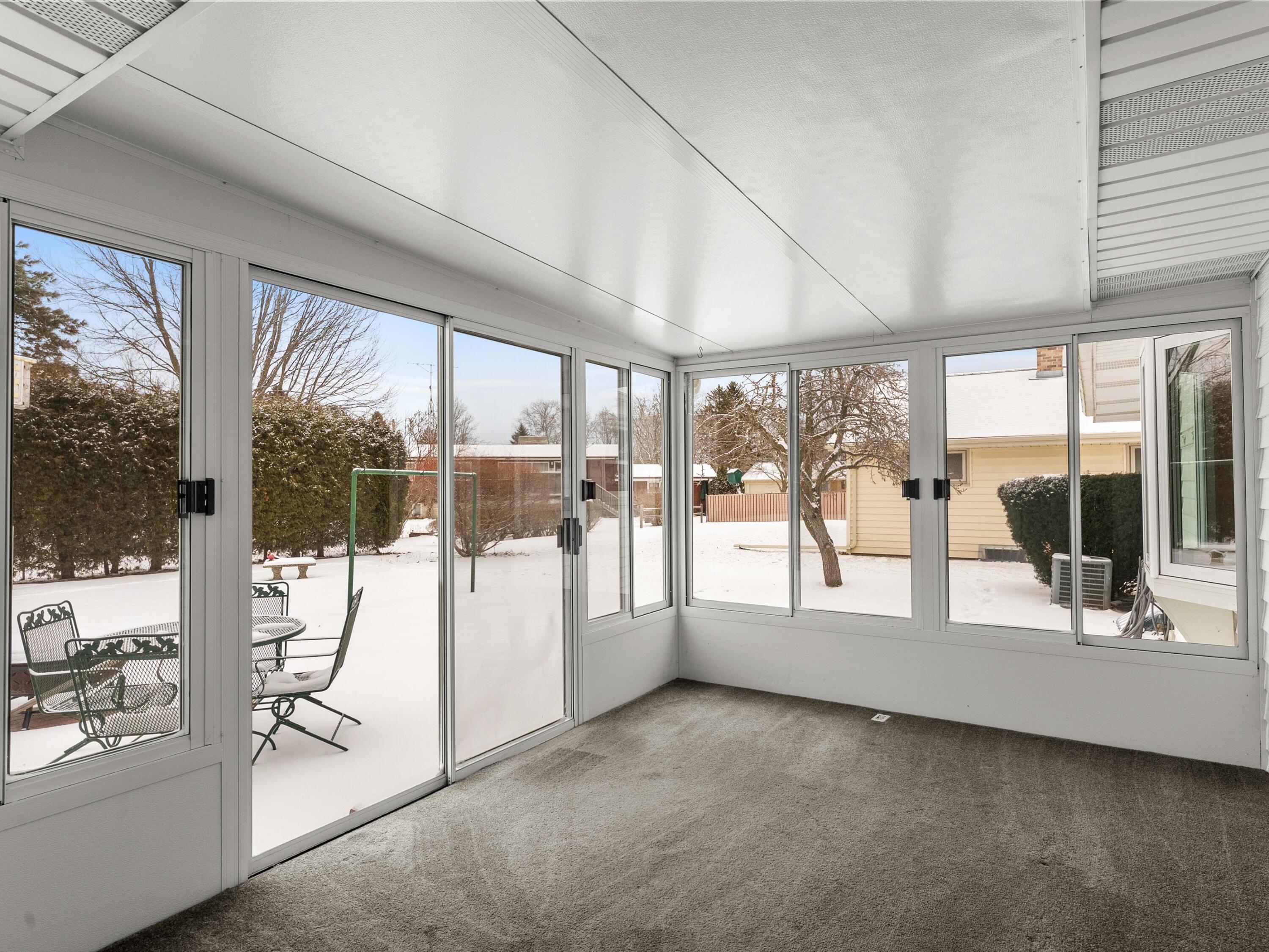 2136 Richmond Avenue Manitowoc, WI 54220 - Photo 28 of 31 Screened Porch/Sun Room with Electric