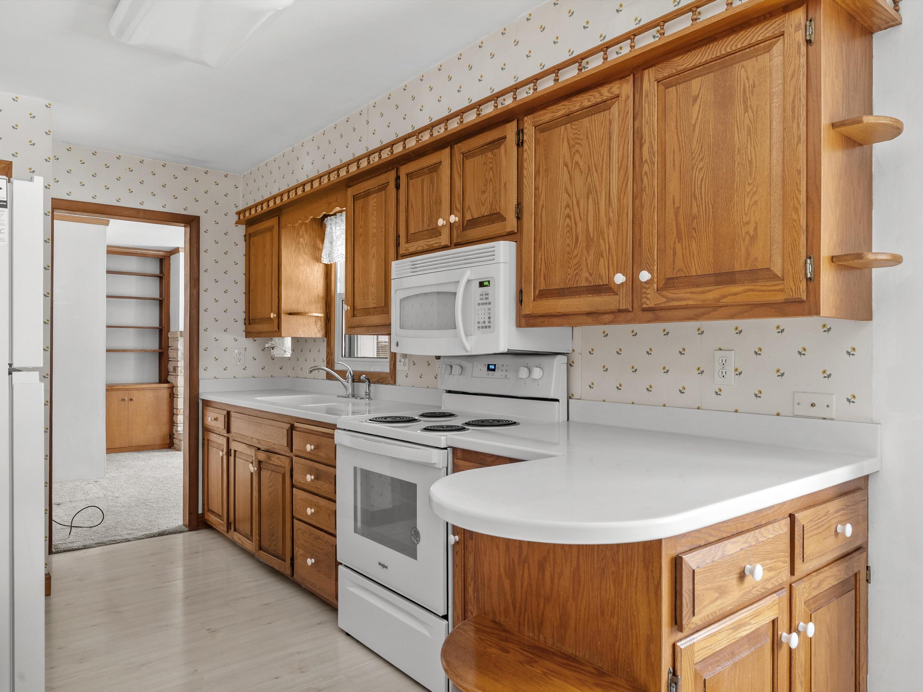 2136 Richmond Avenue Manitowoc, WI 54220 - Photo 4 of 31 Kitchen with Corian Countertops