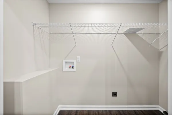 a view of small space with racks on the wall