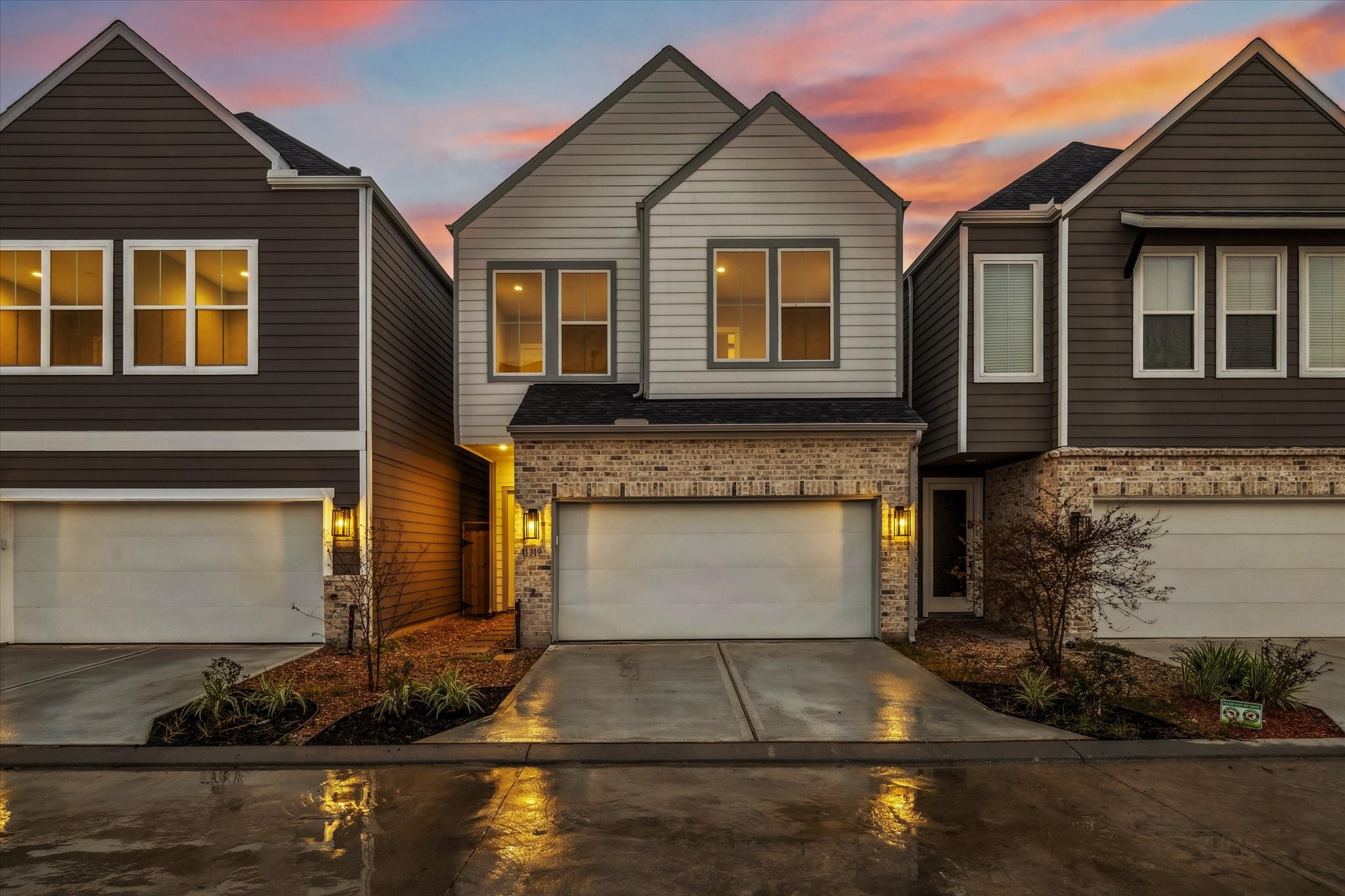11327 Stonework Grove Lane Houston, TX 77076 - Photo 36 of 37 a front view of a house with yard